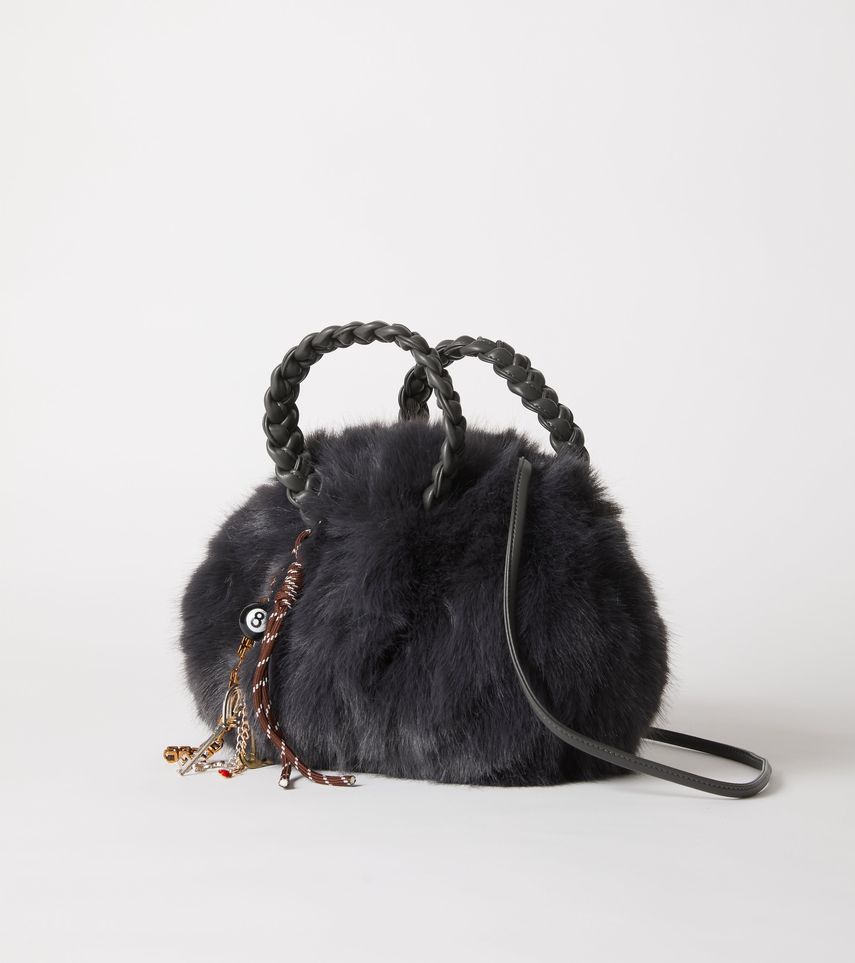 Borsa in ecopelliccia con manici intrecciati