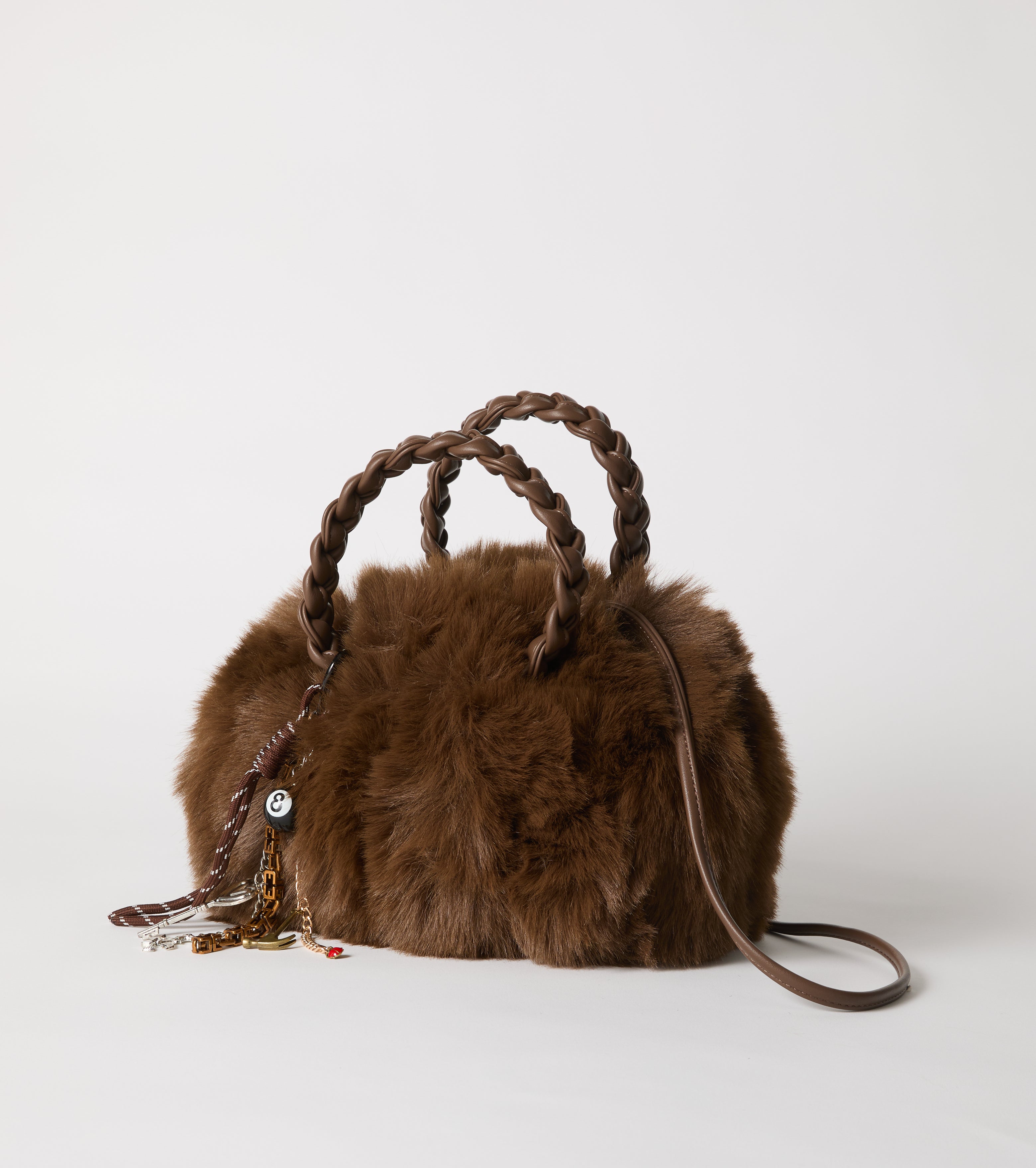 Borsa in ecopelliccia con manici intrecciati