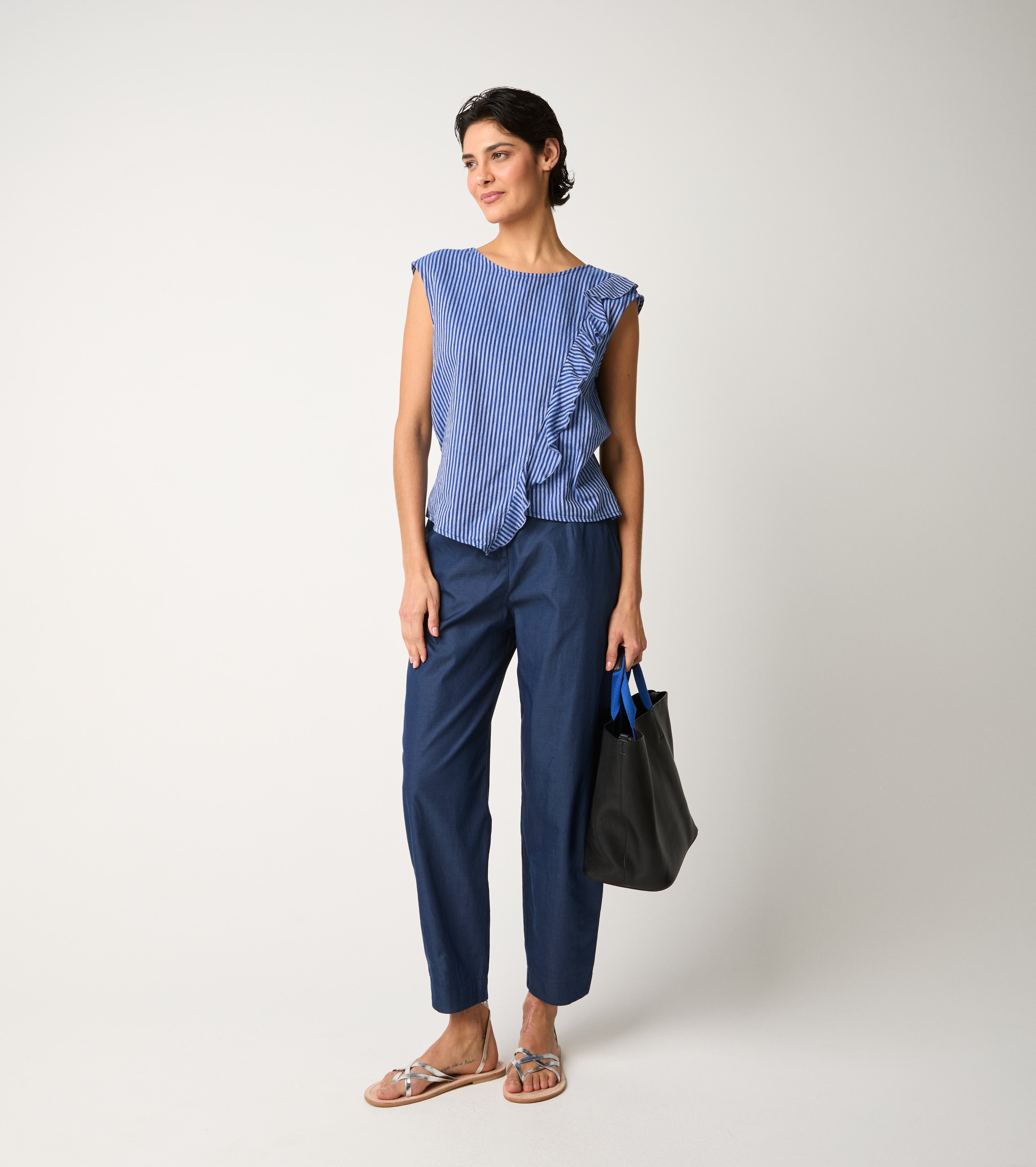 Tuta a righe con rouches azzurro