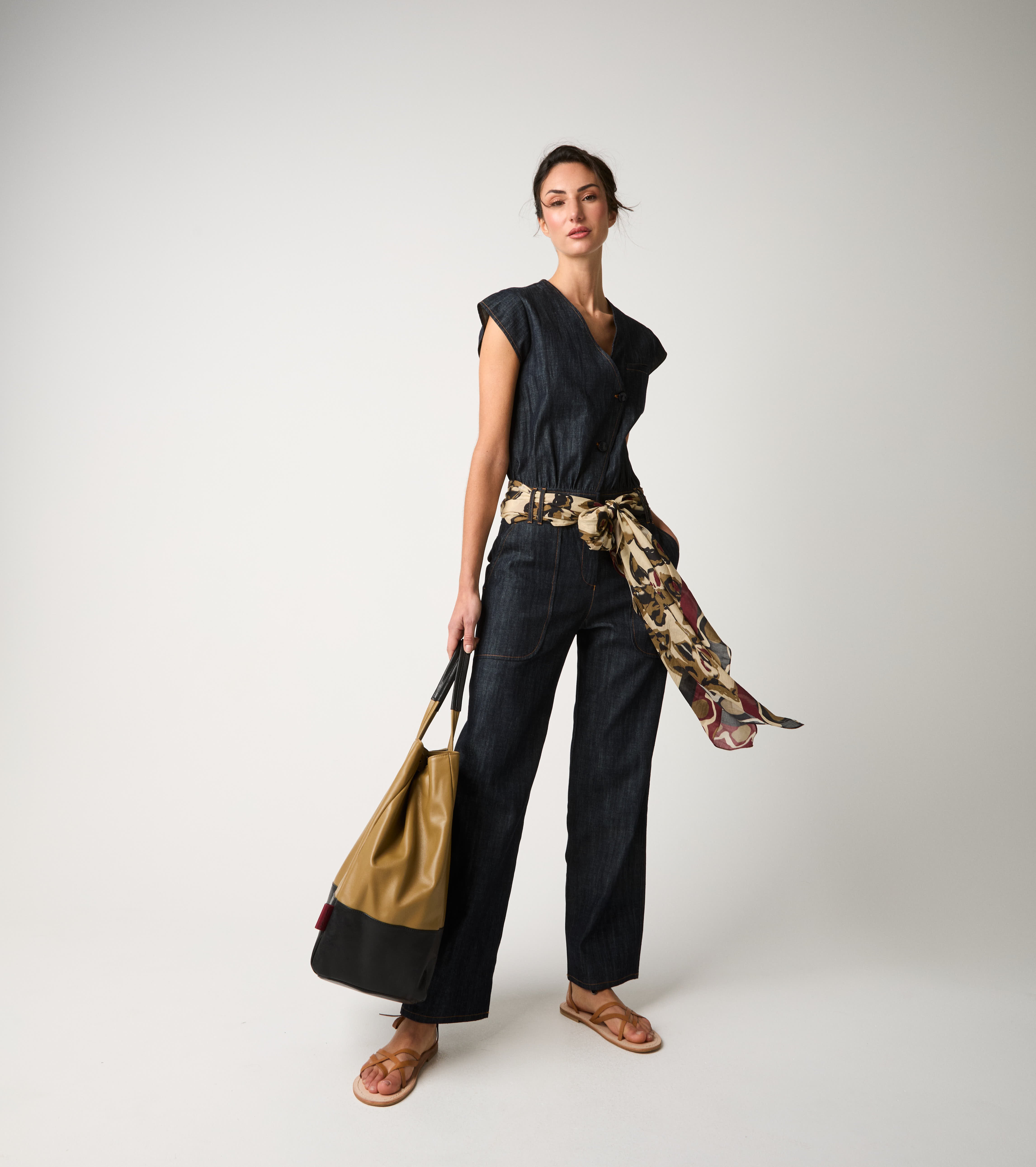 Women's denim jumpsuit with single buttons