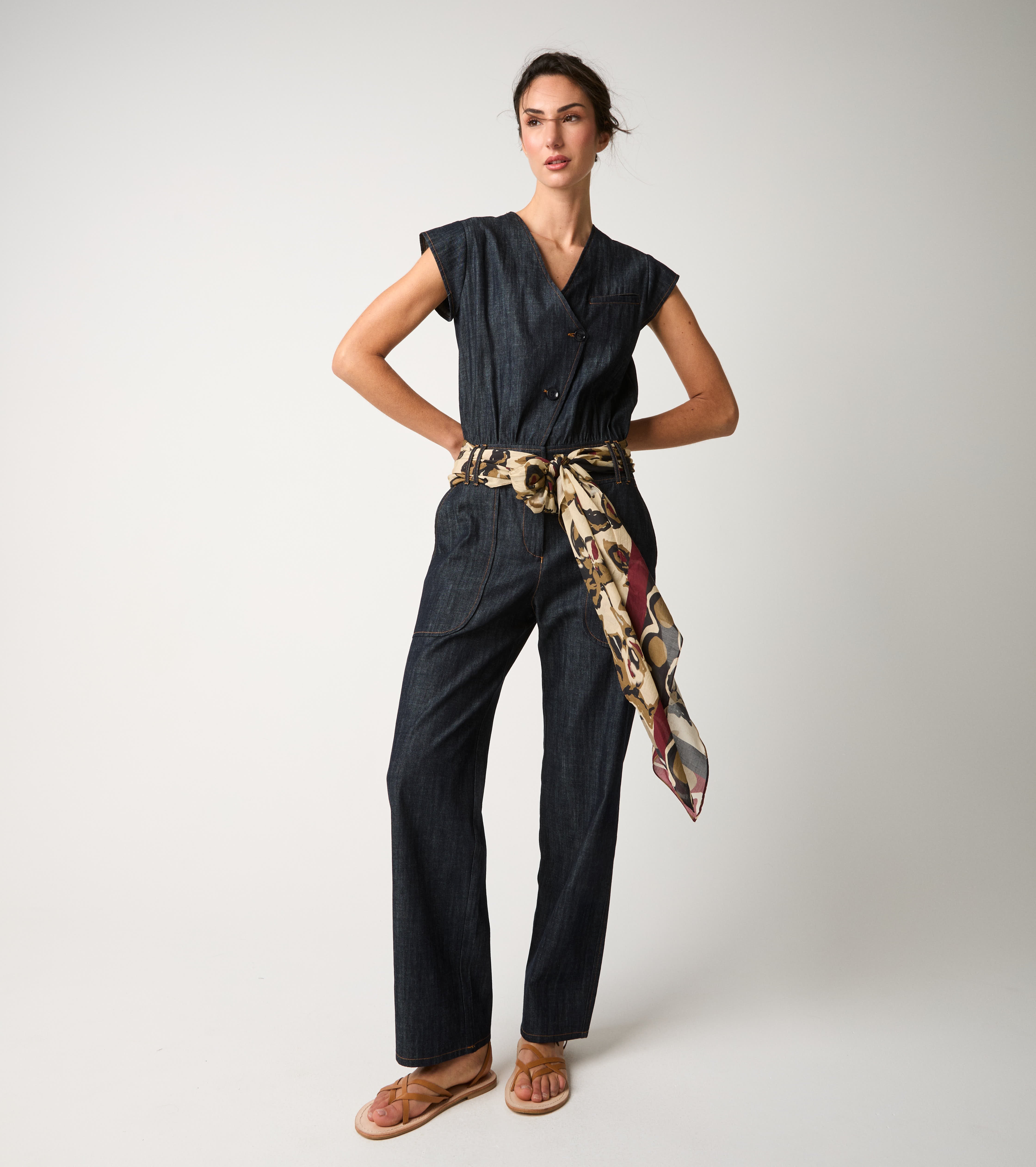 Women's denim jumpsuit with single buttons