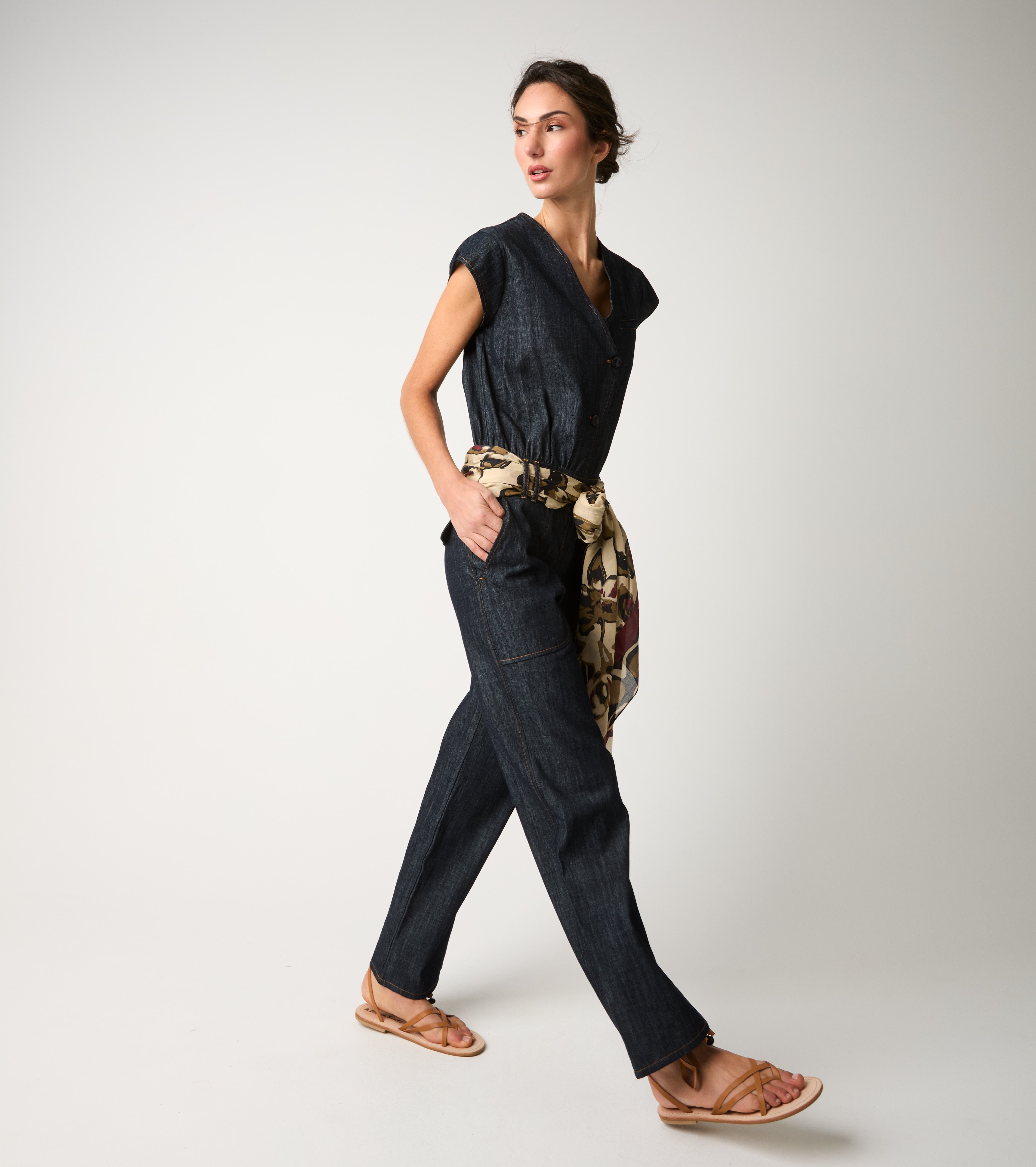 Women's denim jumpsuit with single buttons