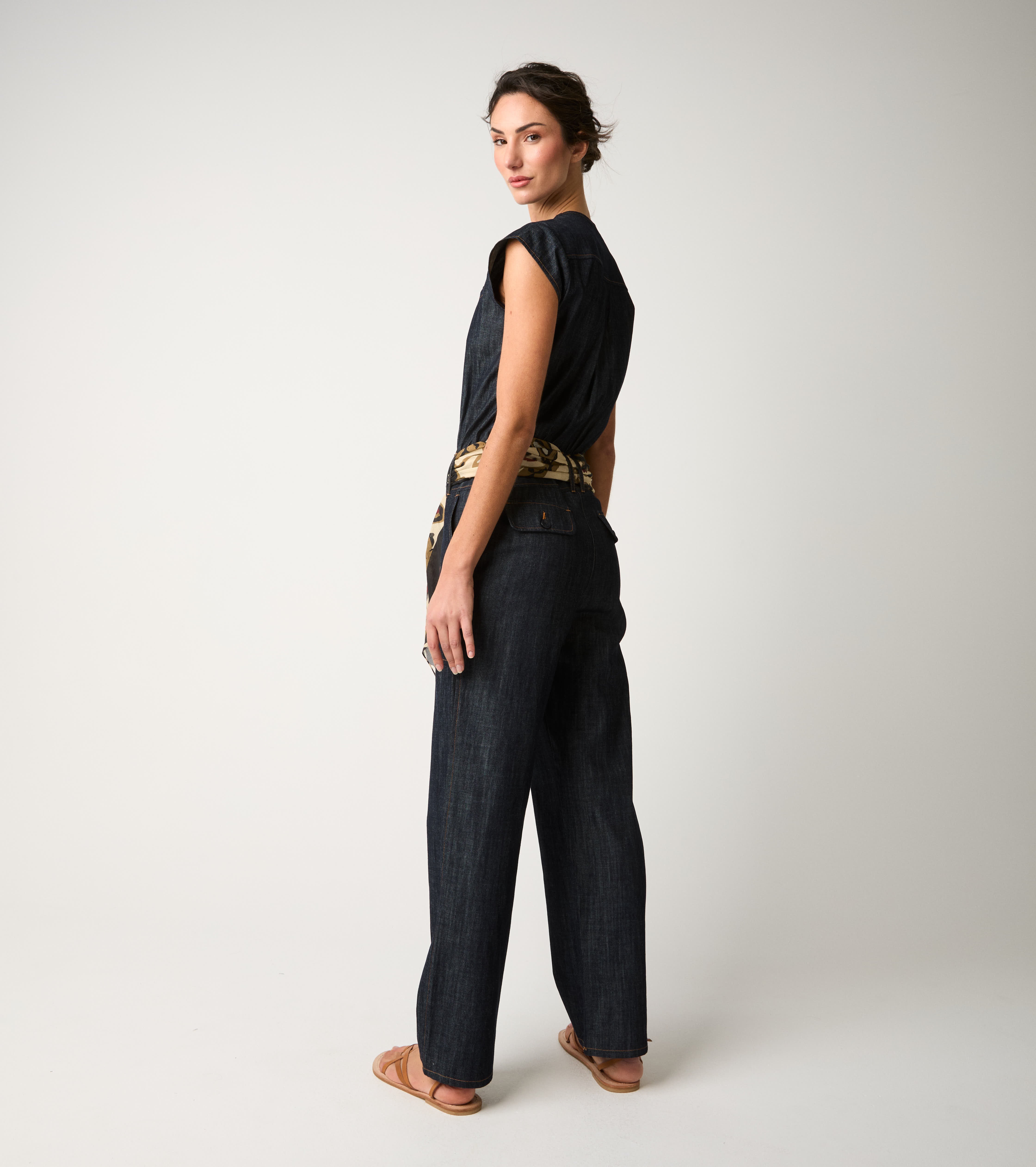 Women's denim jumpsuit with single buttons