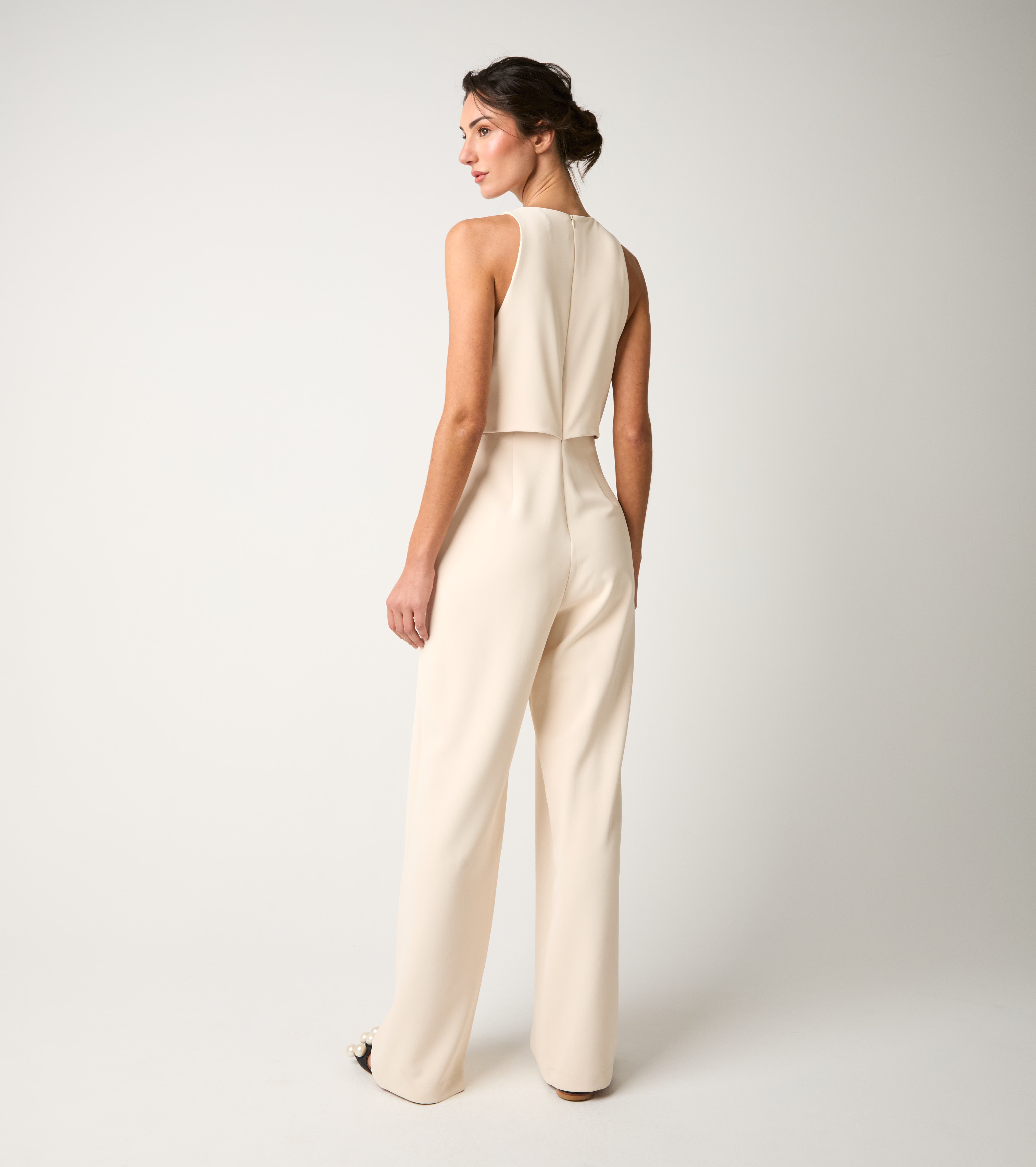 Tuta stretch con scollo rotondo champagne