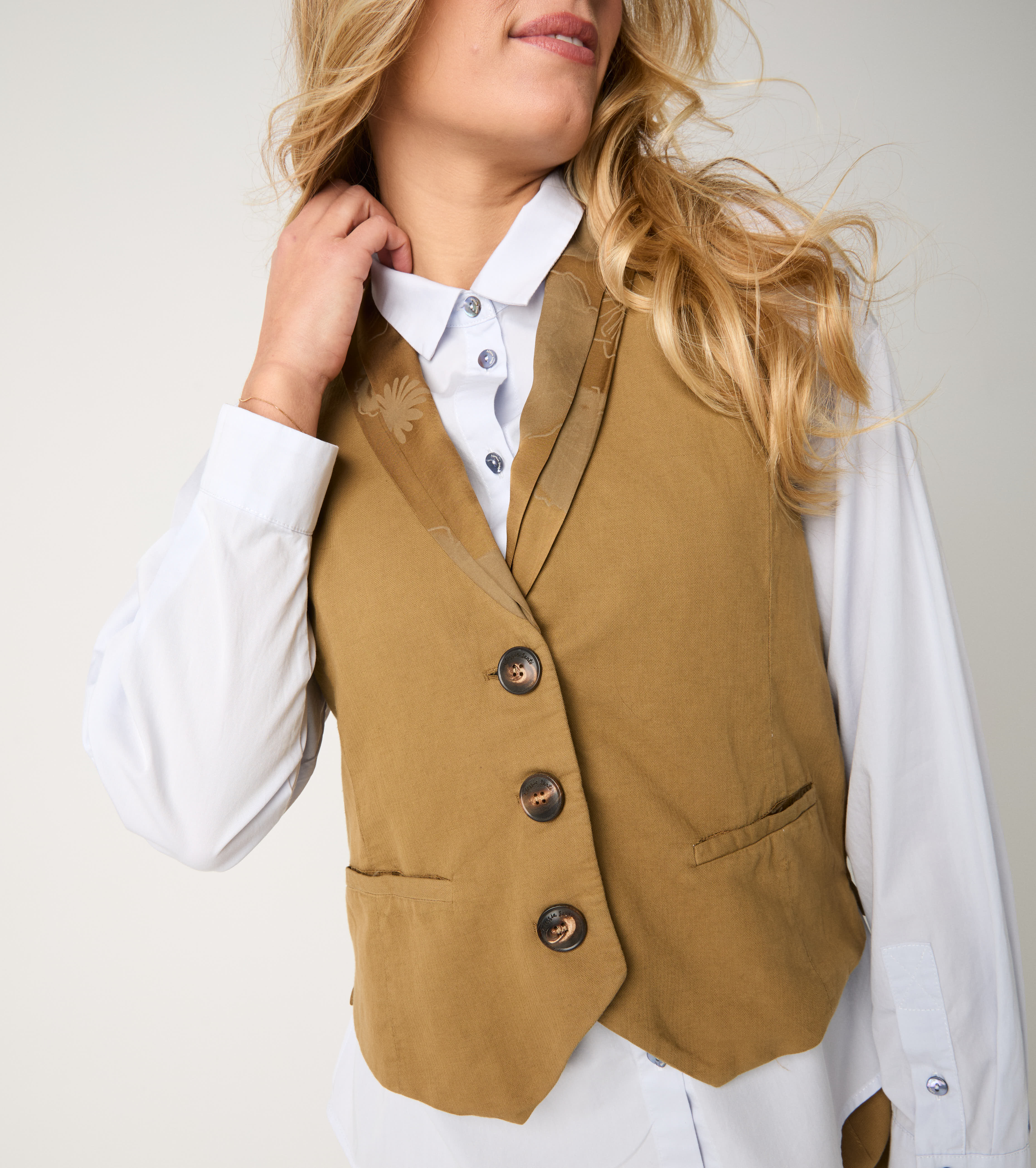 V-neck waistcoat with gold buttons
