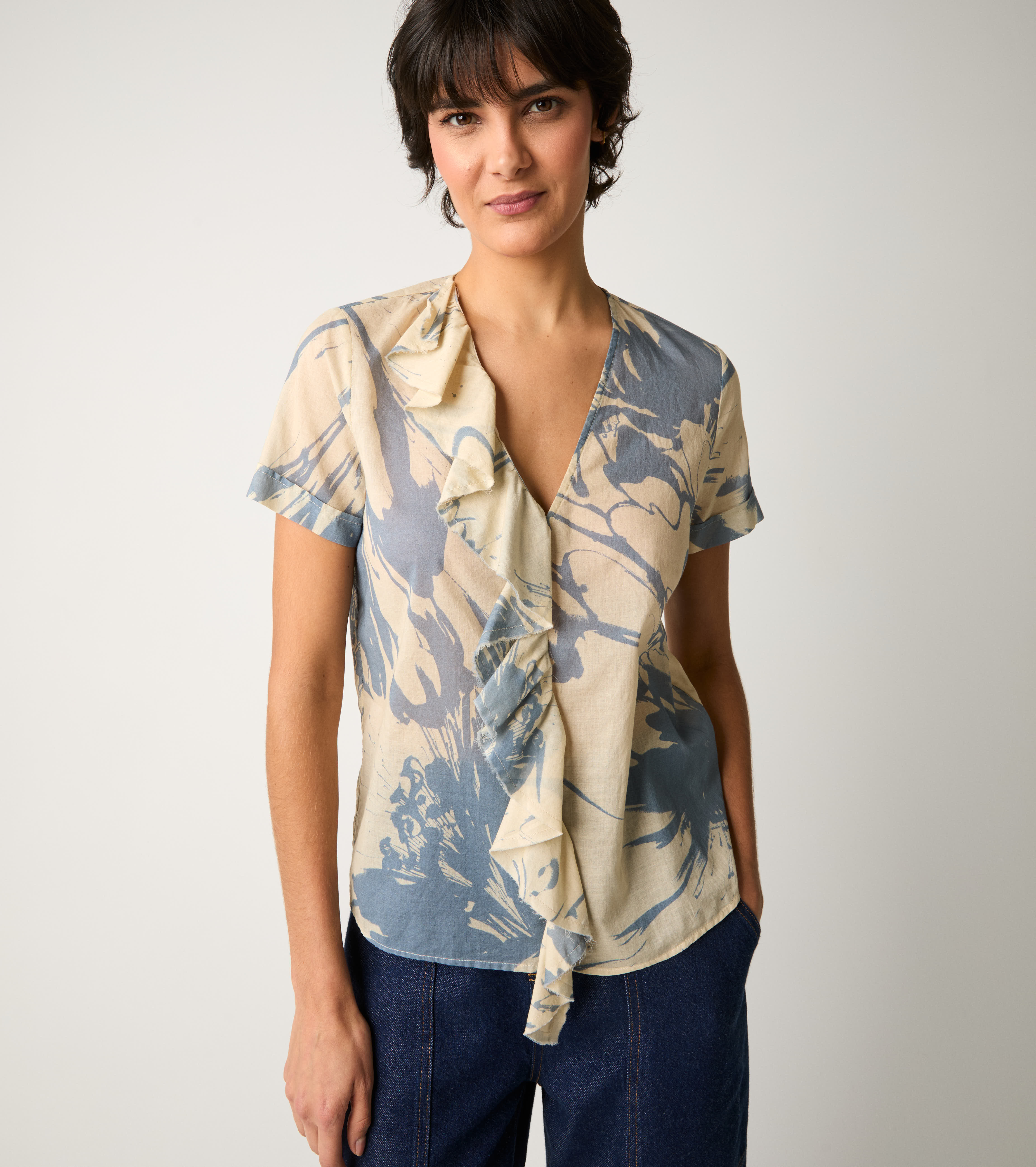 Blusa con stampa e rouches fiore