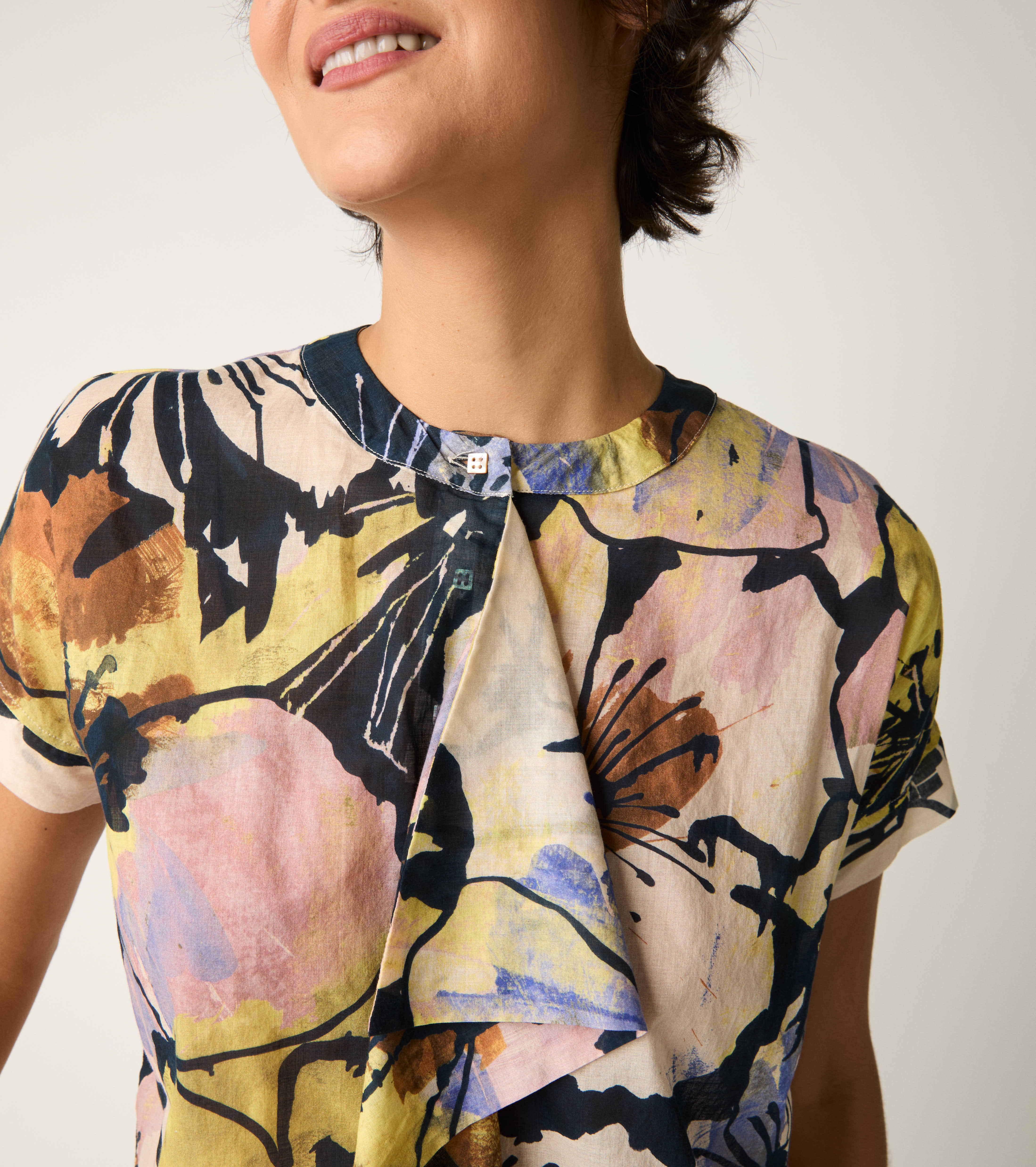 Crew-neck blouse with flower ruffles