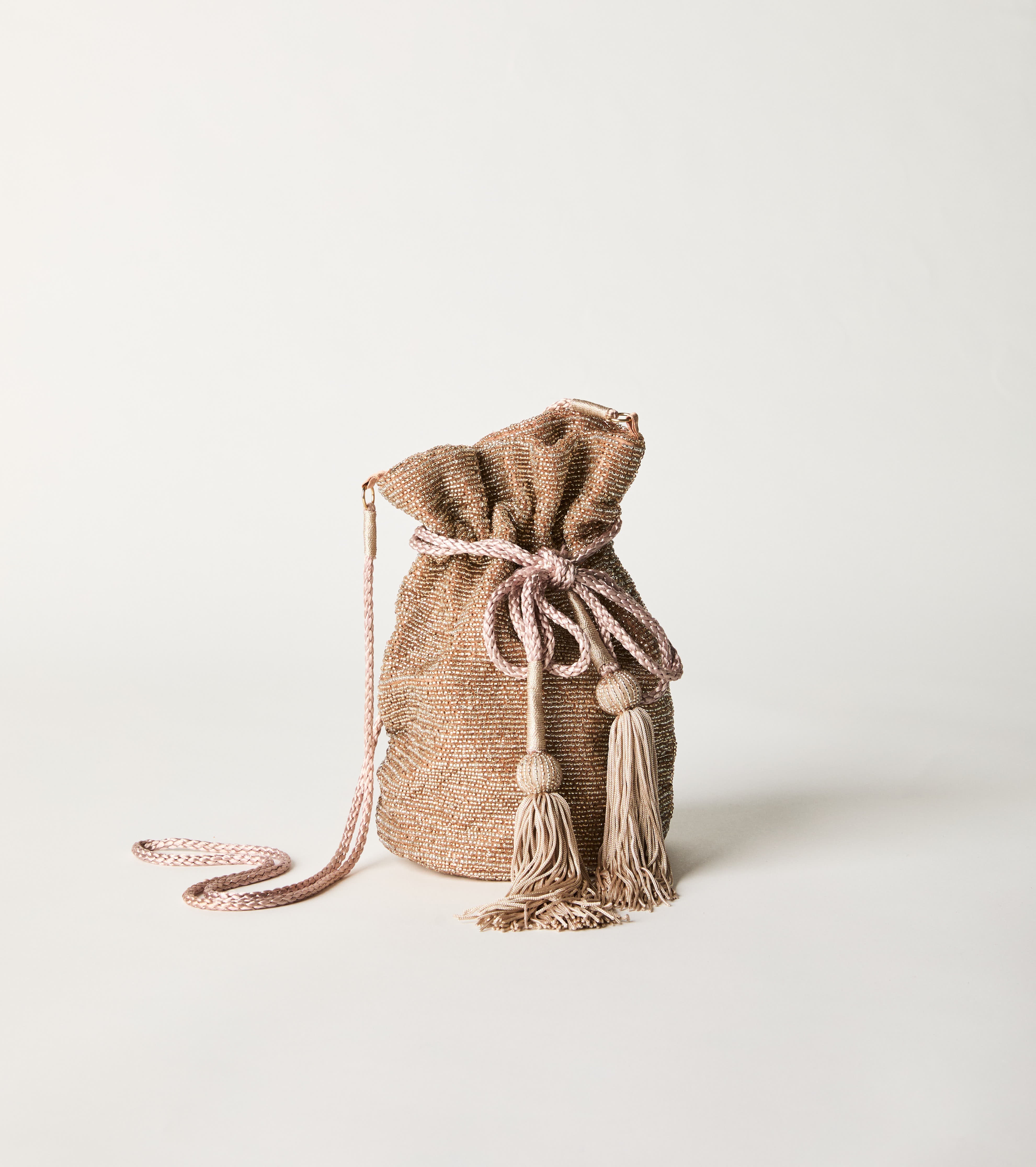 Borsa a secchiello con coulisse e nappine rosa