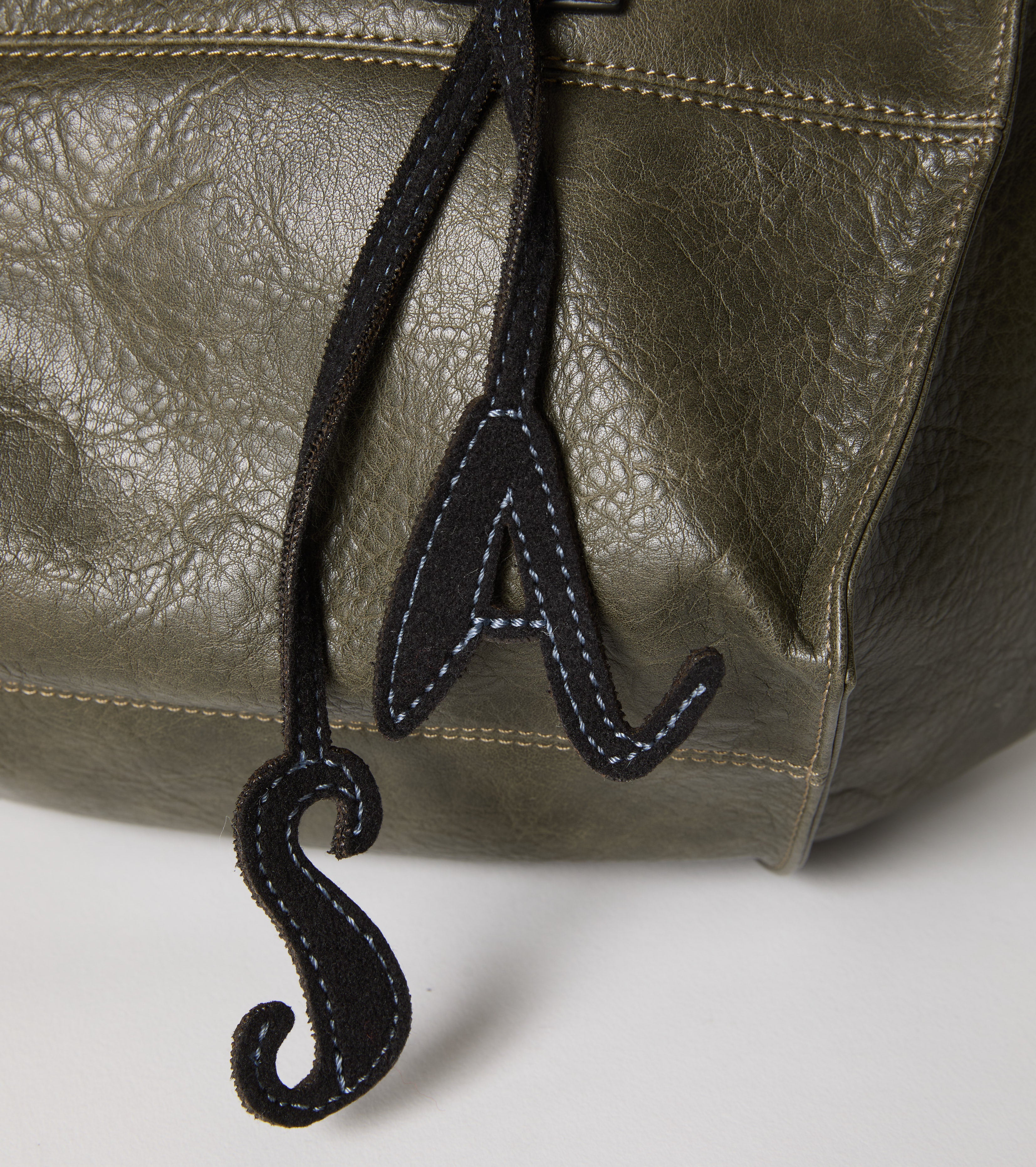 Borsa shopping con charm
