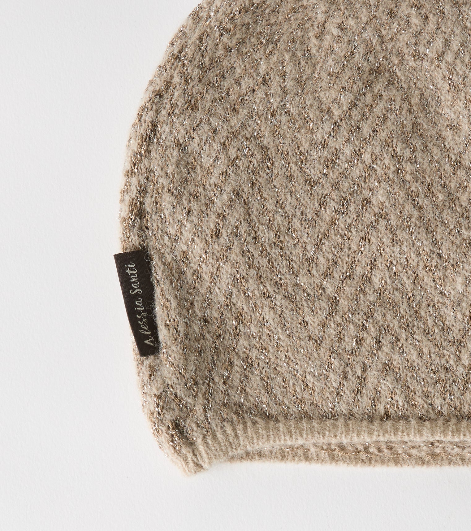 Hue i uldgarn og lurex