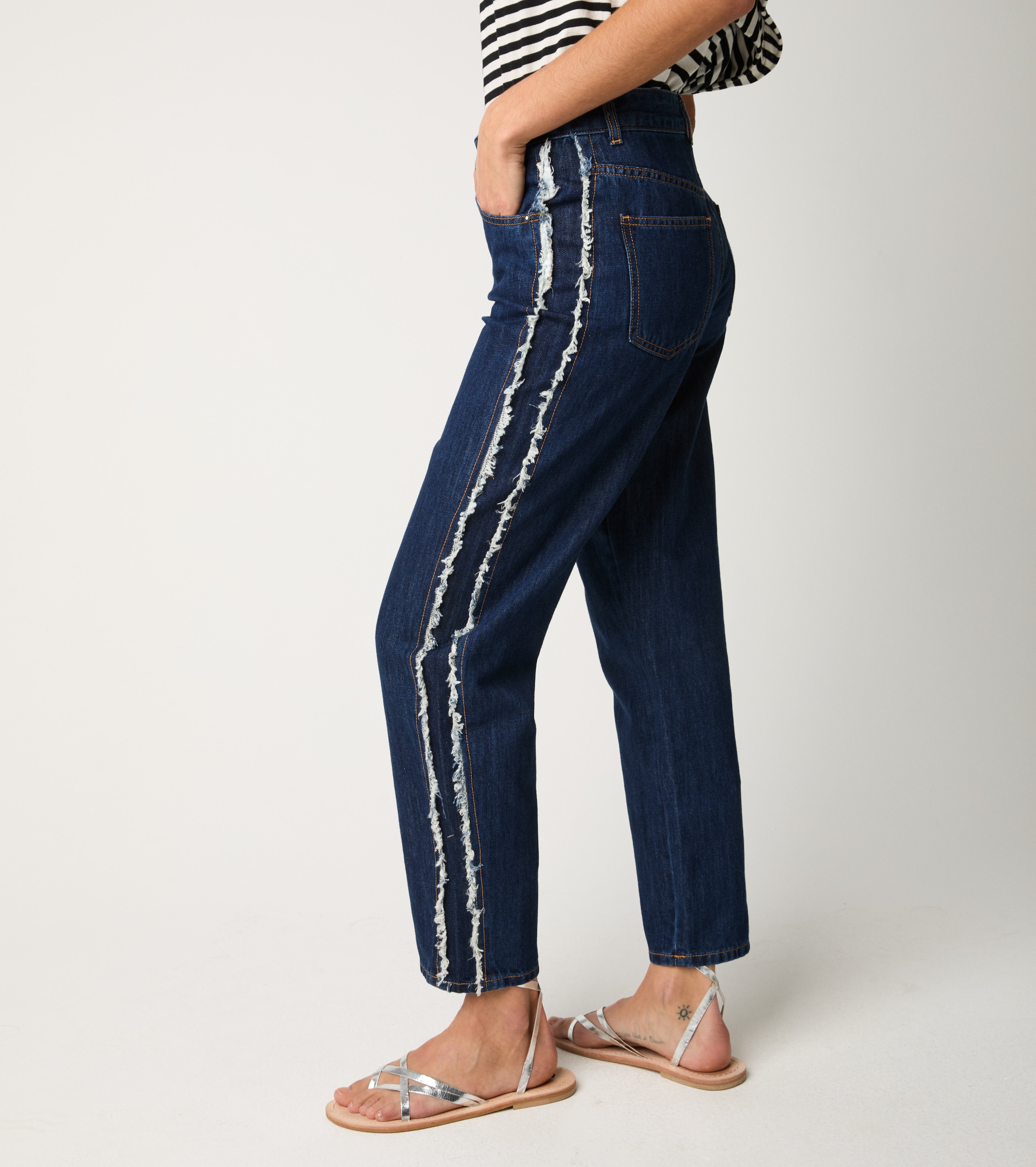 Jeans cinque tasche sfrangiato unico