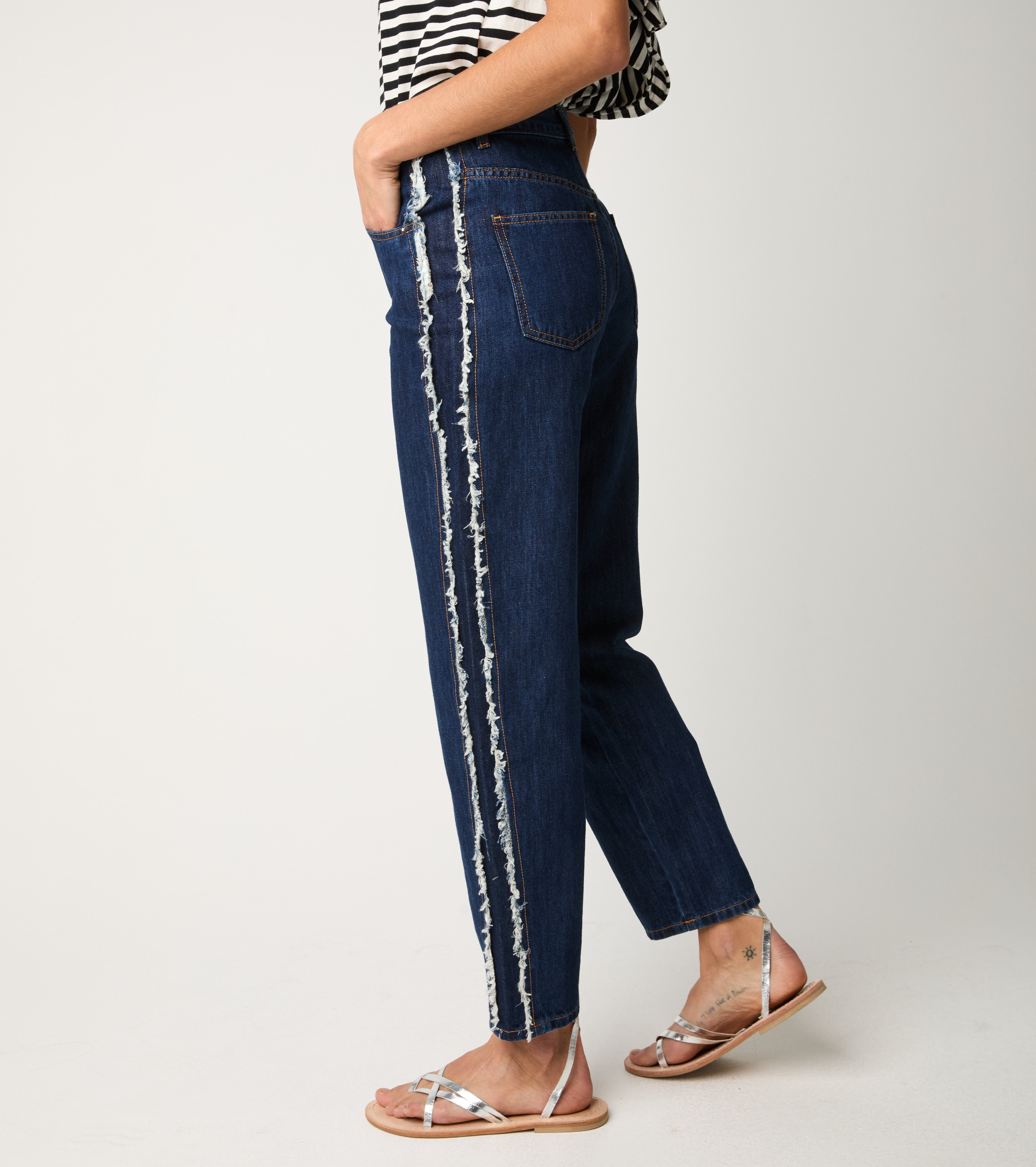 Jeans cinque tasche sfrangiato unico