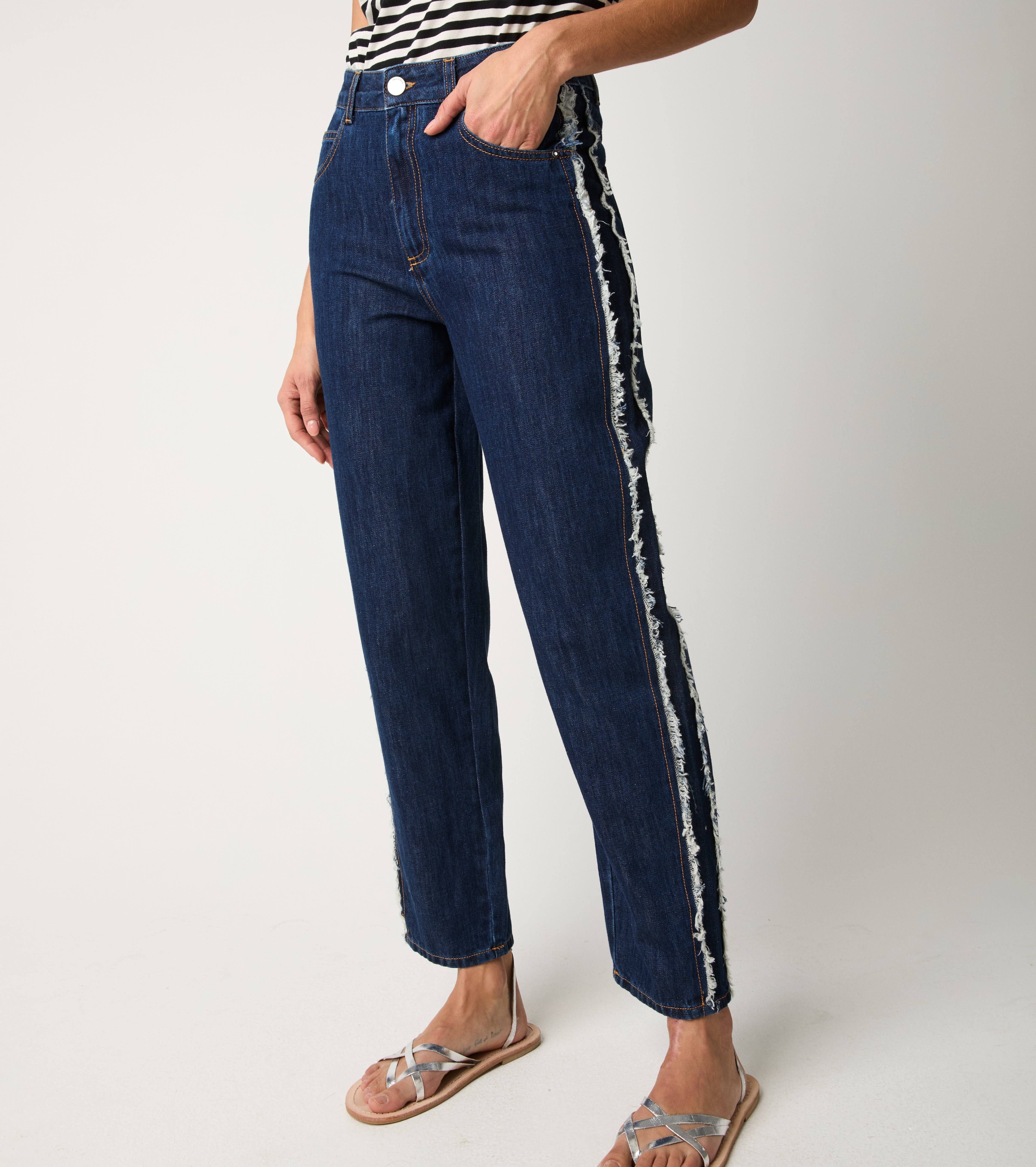 Jeans cinque tasche sfrangiato unico